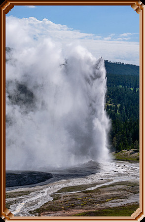 Old Faithful Geyser from the top of Old Faithful Inn